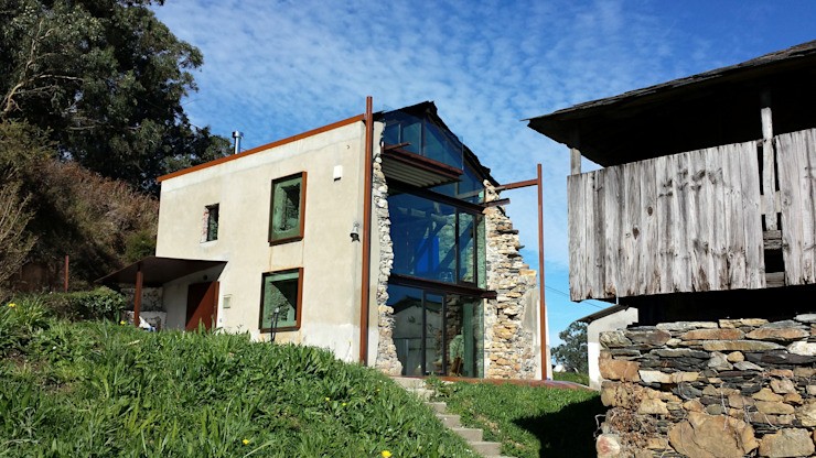 Reforma casei unifamiliale, Tagarro-De Miguel Arquitectos Tagarro-De Miguel Arquitectos Case in stil modern Planta,Cer,Cladire,Proprietate,Nor,Fereastra,Lemn,Copac,Iarba,Cabana